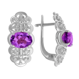 Серебряные cерьги классические с корундом